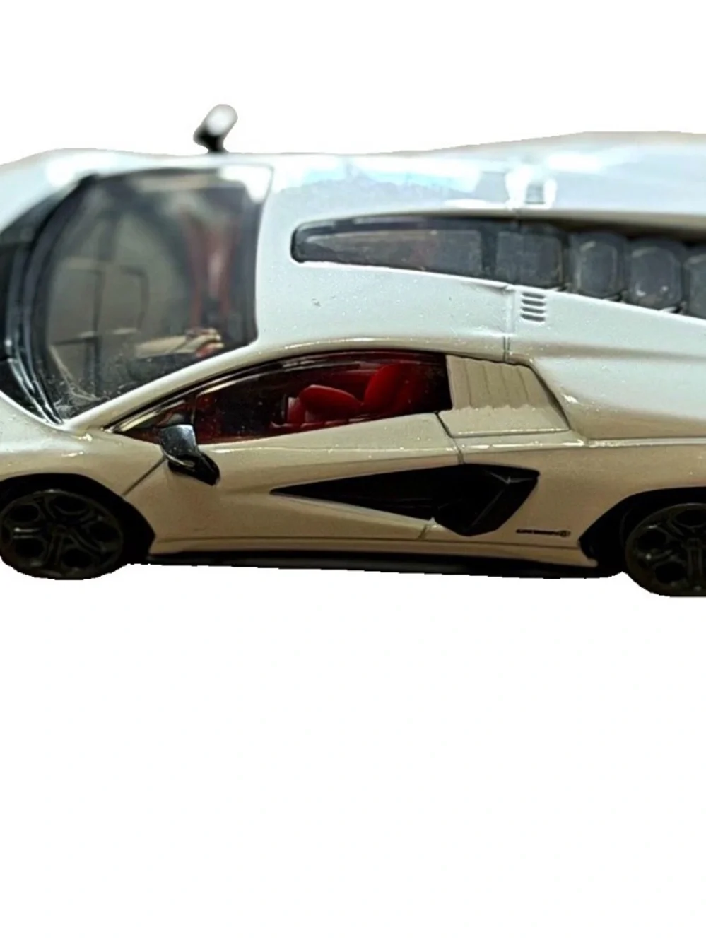 White Die-Cast Sports Car Toy with Red Interior
